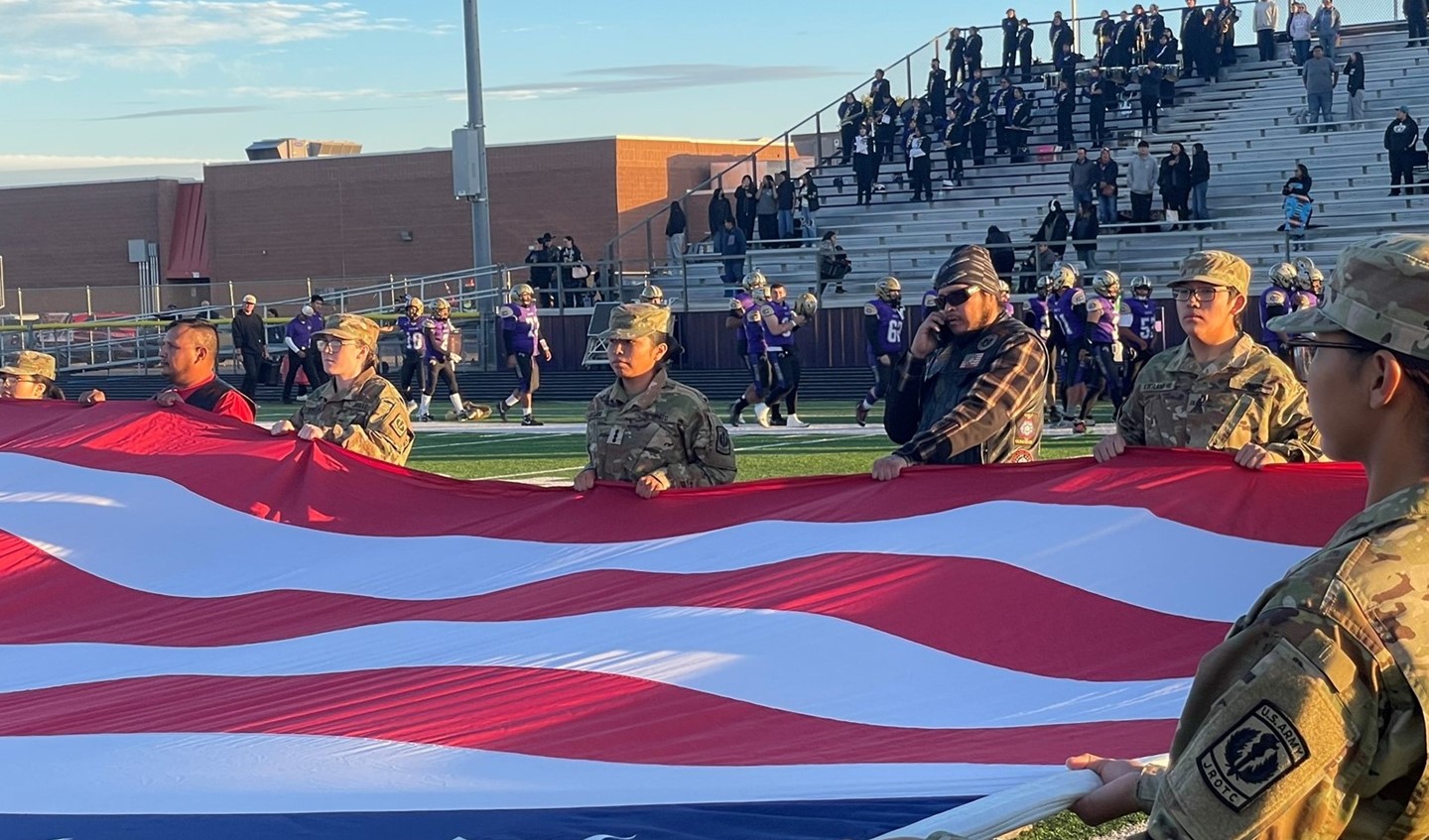 Veterans&#39; Celebration at KCHS Football Game: Giant Flag during National Anthem
