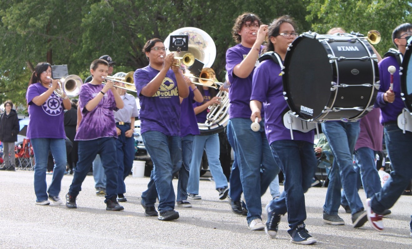 homecoming parade-students from the marching band performing